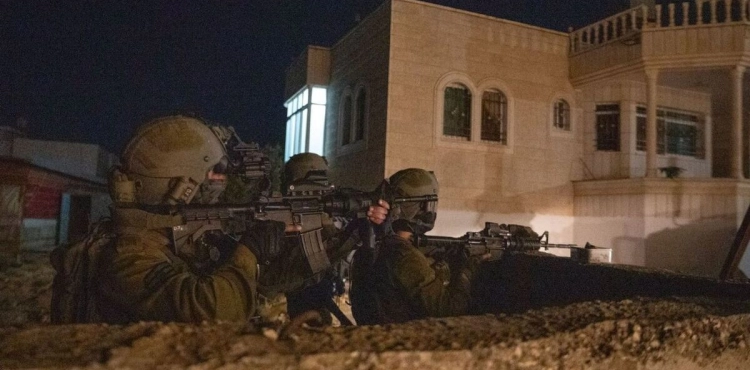Injuries and Arrests in a Series of Raids in the West Ban