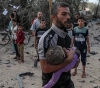 Dozens of martyrs and hundreds of wounded in an occupation massacre in Rafah and Khan Yunis