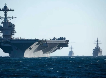 The drums of war are beating... The United States is sending an aircraft carrier to the Middle East.