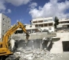 The occupation demolishes 8 houses under construction west of Jericho