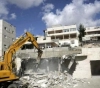 The occupation notifies the demolition of a house and settlers destroy a mobile home