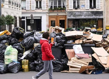 Heaps of rubbish obscure the sights of Paris, and its scent spreads through the city of lights
