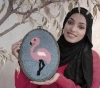 A young woman from Gaza uses &quot;wool&quot; to create paintings