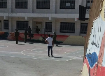 The Israeli army is attacking a Palestinian school and arresting three of its requests.