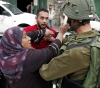 Israeli forces arrest a Palestinian woman from Ramallah