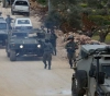 The occupation forces arrested 21 Palestinian citizens in the West Bank and Jerusalem
