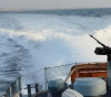 The occupation navy opens its fire towards the fishermen&acute;s boats off the Gaza Sea