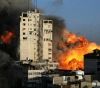 Occupation warplanes bomb Al-Shorouk Tower in the center of Gaza City