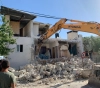 The occupation forces a citizen of Shuafat to demolish his house