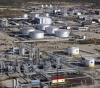 Commercial tensions land in oil