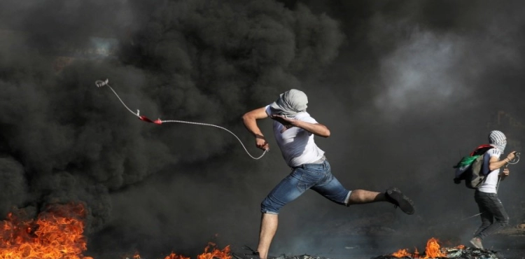 Dozens injured by metal bullets and suffocation in Kafr Qaddoum clashes