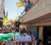 Large crowds attend the funeral of the martyr Mohamed Hassan in Qusra