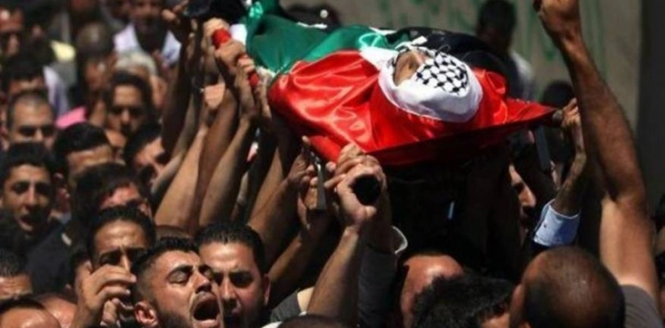 Hundreds mourn the bodies of 3 martyrs in Ramallah