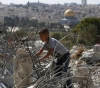 Human Rights Center: The occupation expands the policy of forcing Palestinians to self-demolish their homes
