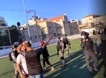 The occupation stormed a party honoring students in Issawiya