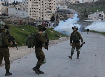 3 young men were shot and dozens suffocated in clashes with the occupation in Kafr Qaddoum