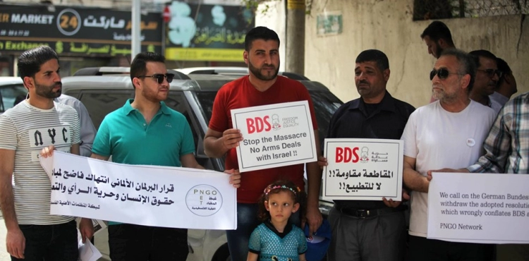 A protest in Gaza calls on the German parliament to back down on its decision against &quot;BDS&quot;