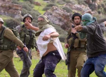 Israeli settlers attack Palestinian commuters on a northern West Bank road