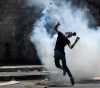 Two metal bullets and dozens suffocated as a result of the repression of the occupation March kafr Kaddoum