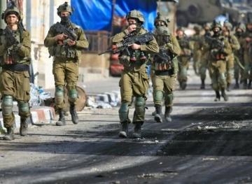 The occupation arrests two children northeast of Ramallah