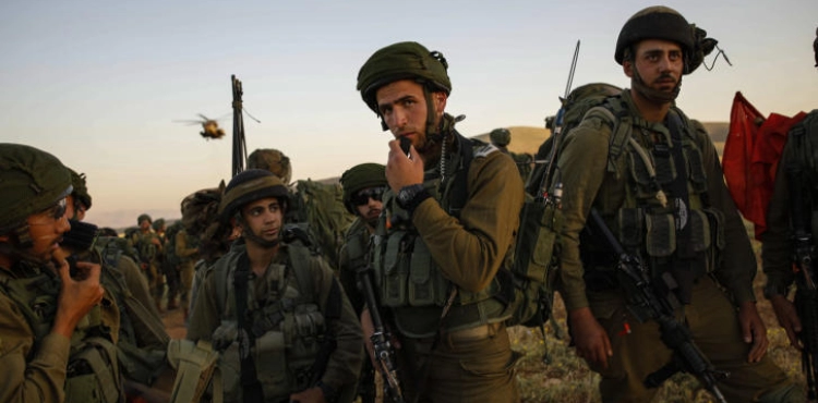 Israel discusses draft law to protect its soldiers from criminal prosecution
