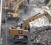 Israeli bulldozers demolish 20 shops in Shuafat refugee camp in Jerusalem