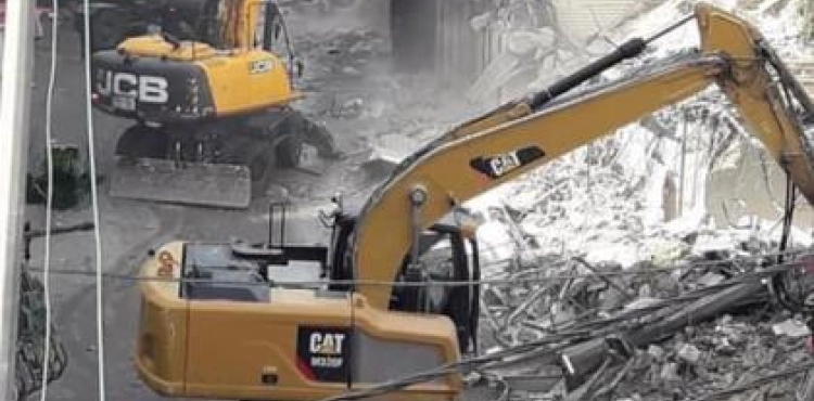 Israeli bulldozers demolish 20 shops in Shuafat refugee camp in Jerusalem