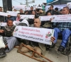 Dozens of people with disabilities demonstrate in Gaza