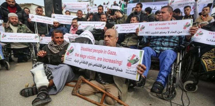 Dozens of people with disabilities demonstrate in Gaza