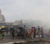 Two people killed and 15 injured in an explosion at a popular market in eastern Baghdad