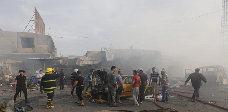 Two people killed and 15 injured in an explosion at a popular market in eastern Baghdad