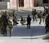 Israeli forces arrest 9 citizens from Nablus