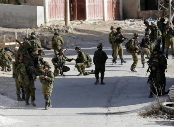 Israeli forces arrest 9 citizens from Nablus