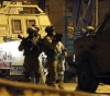 Israeli soldiers shot and killed a Palestinian intelligence officer and caused his leg to be amputated.