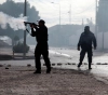 Protests in Tunisia following the suicide of a journalist photographer burned