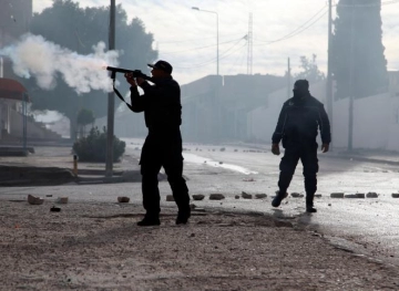 Protests in Tunisia following the suicide of a journalist photographer burned