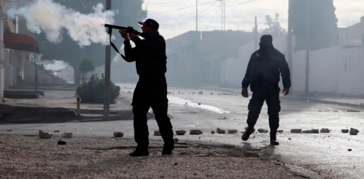 Protests in Tunisia following the suicide of a journalist photographer burned