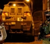 Israeli forces arrest 3 youths, seize surveillance footage