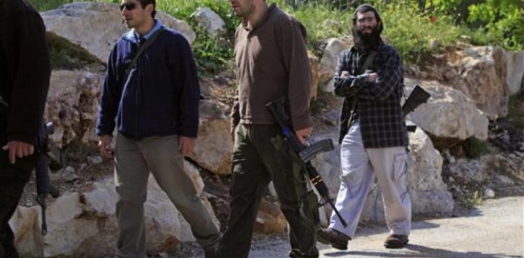 Settlers close the entrance to the eastern milk south of Nablus
