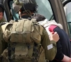 Settlers attack elderly and sons and arrest one of them in Arroub camp