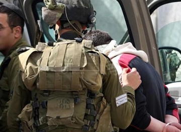 Settlers attack elderly and sons and arrest one of them in Arroub camp