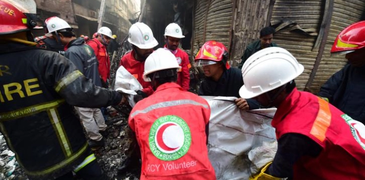 At least 69 dead in a huge fire in Dhaka