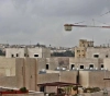 Signing an agreement to build 23,000 settlement units in occupied Jerusalem