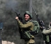 A Palestinian wounded by Israeli fire in Sair
