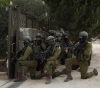 Occupation arrests 7 citizens and confiscates weapons and funds