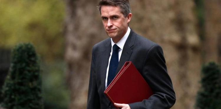 Dismissal of British defense minister over national security leaks