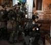 The occupation arrests five citizens, including two children.