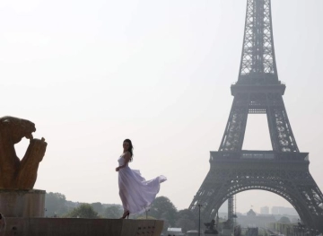 Eiffel is 130 years old and Paris celebrates laser