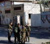 The arrest of a girl near the Cave of the Patriarchs