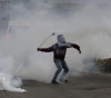 Injured young man and assault on journalists in the march of Kafr Qaddum